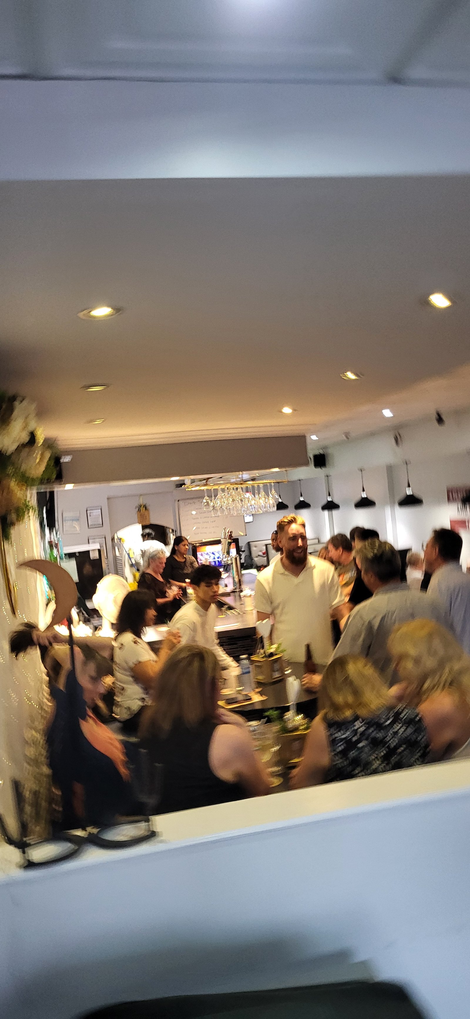 Guests cheering at the bar